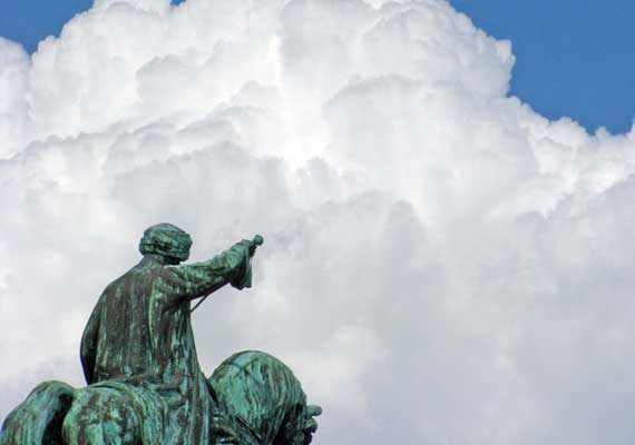 Old monument in front of the clouds