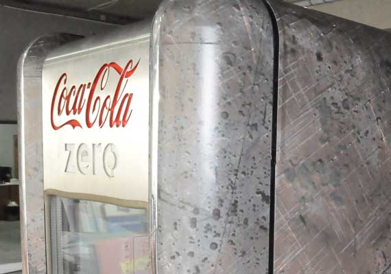 Custom 'Weathered-metal look' wraps for the old Coca-Cola commercial fridge (design and prepress).